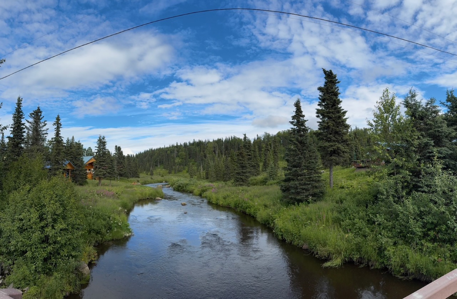 A river run — fishing line cast out, the work of a salmon day