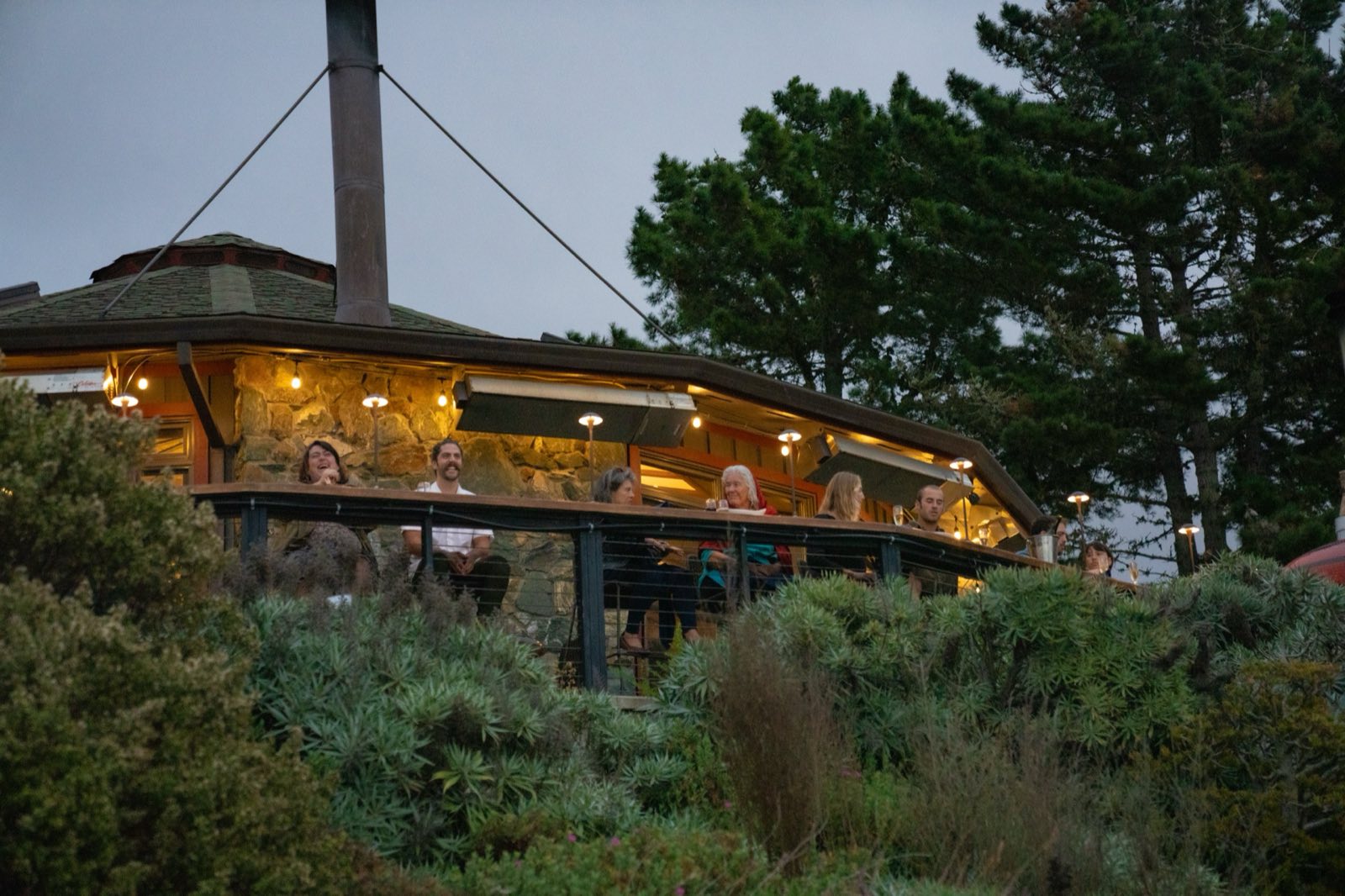 Treebones Resort lodge at twilight on the Big Sur bluff