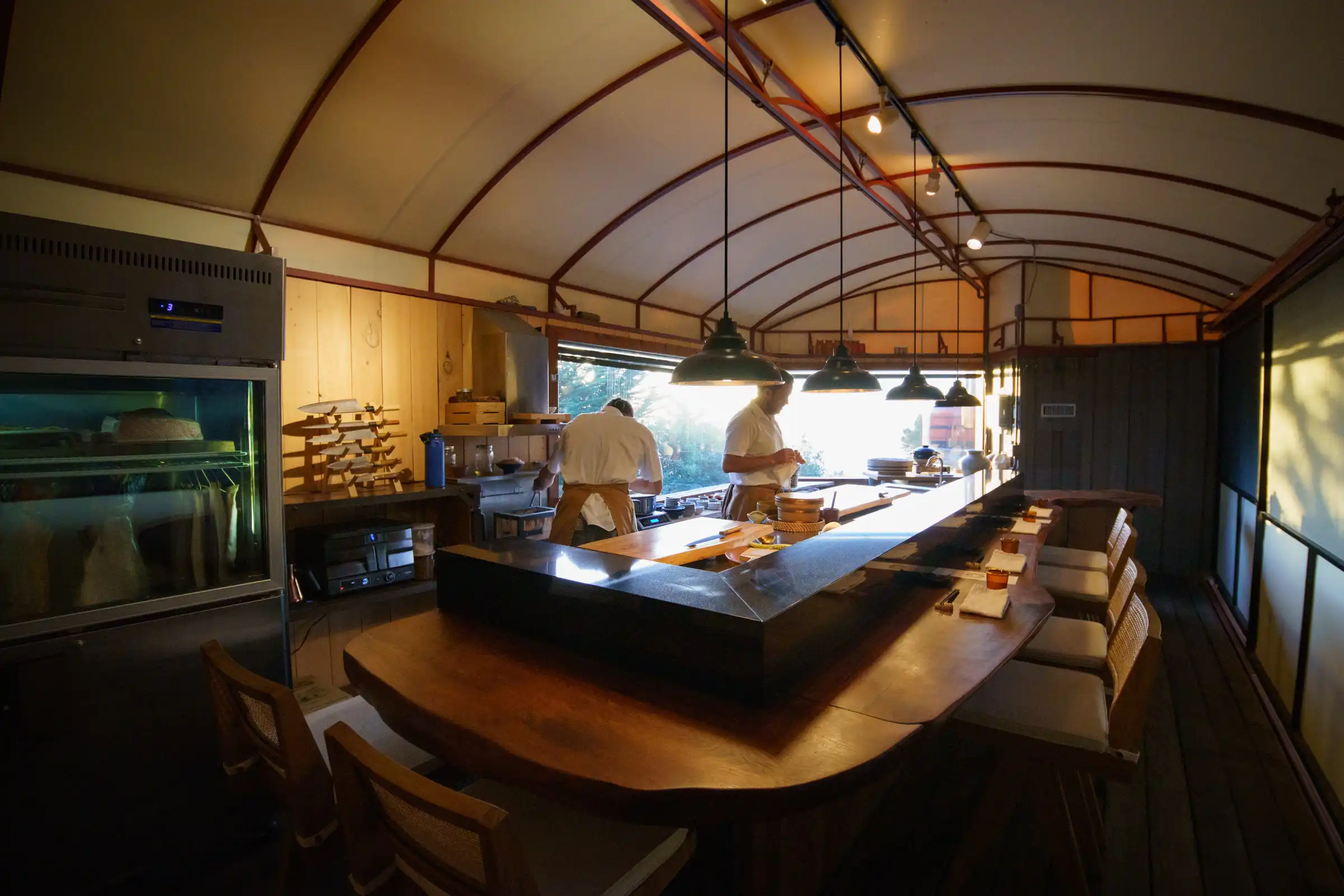 Wild Coast Sushi interior — open kitchen with chefs at the counter